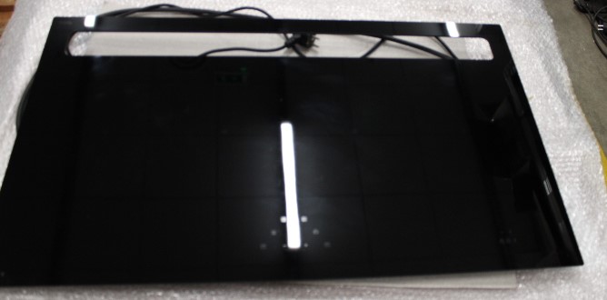 Novy | 1821 | Induction hob with built-in hood | 88 cm | Number of burners/cooking zones 4 | Yes | Black | Slider control with white LEDs. | USED, REFURBISHED, SCRATCHED - Image 2