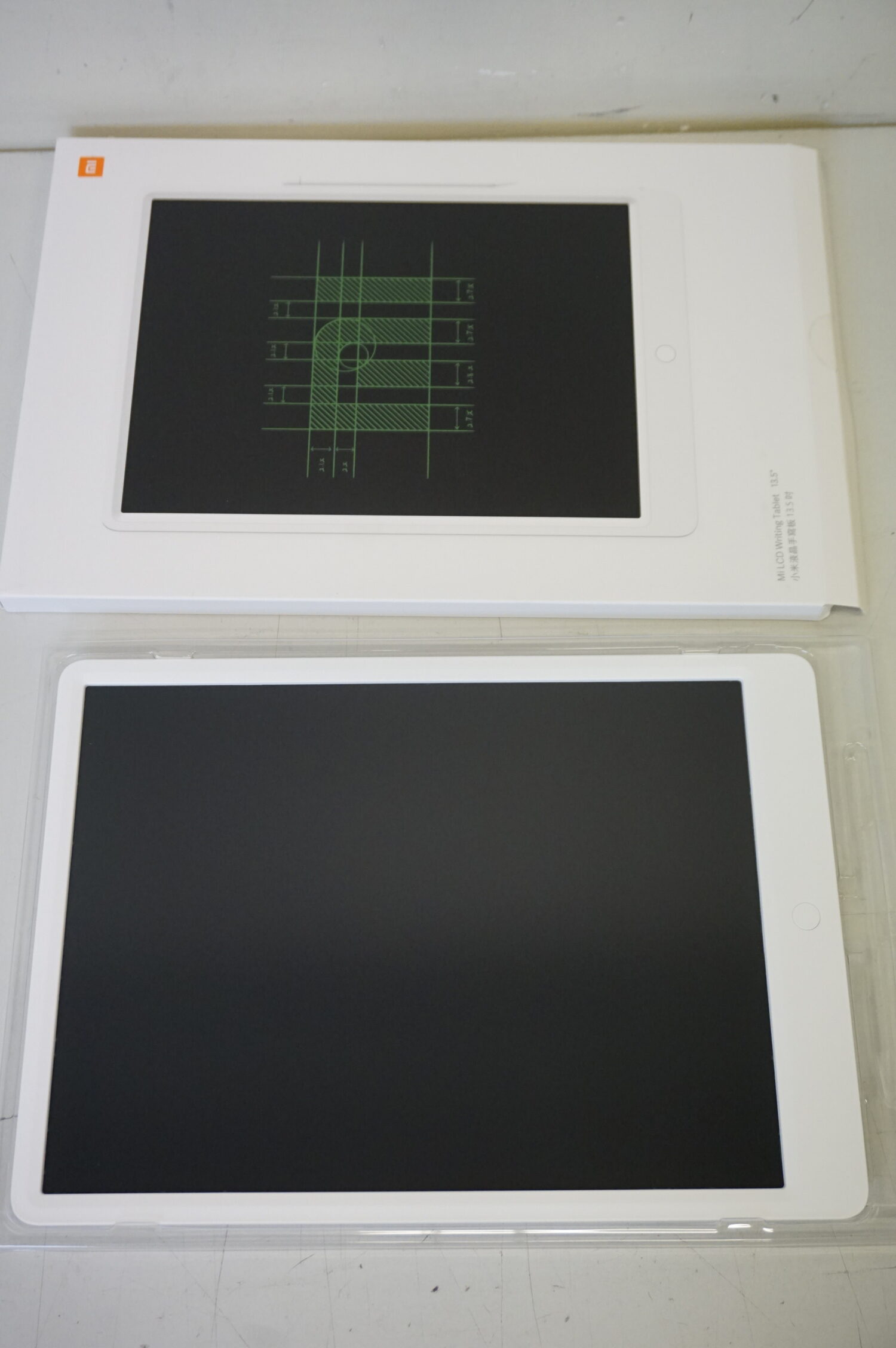 SALE OUT.  | Xiaomi | Mi LCD Writing Tablet | 13.5 " | LCD | USED, SCRATCHED ,DIRTY ,MISSING PEN | Black Board/Green Font | It has no memory - you write one page, then delete it completely with one button; The life of the button battery is about a year when the display is cleared 100 times a day